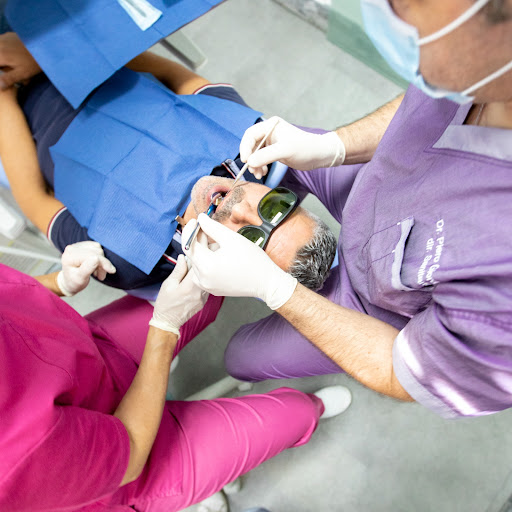 Studio Dentistico Modeldent Clinica Odontoiatrica logo